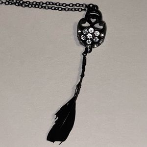 Claire’s Rhinestone Black Skull & Feather Necklace